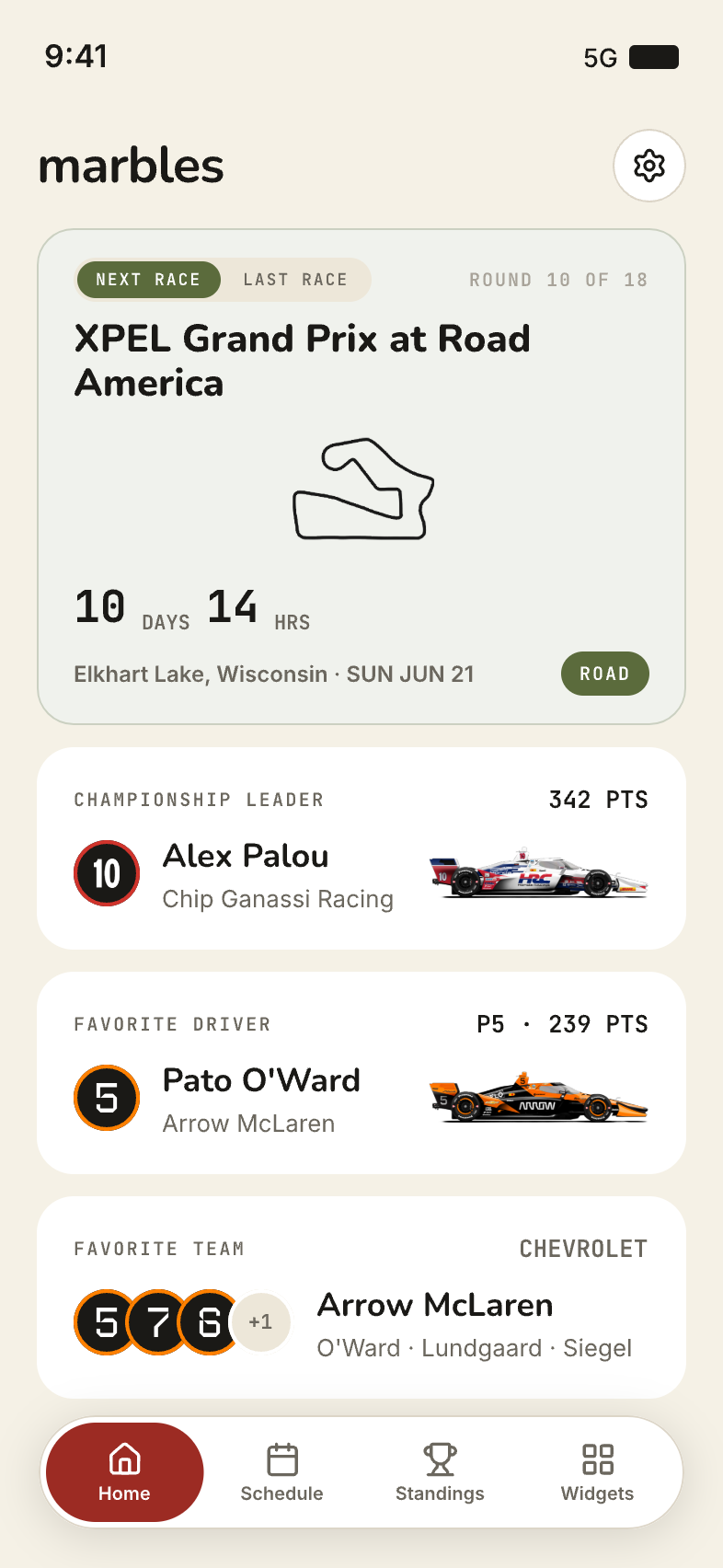 The Marbles home screen showing the next-race countdown for the XPEL Grand Prix at Road America, the championship leader Alex Palou, and a favorite driver card.